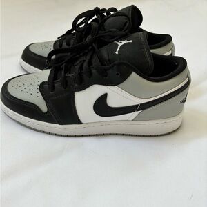 Air Jordan 1 lows. Boys soze 5Y which fits women’s size 6.5
